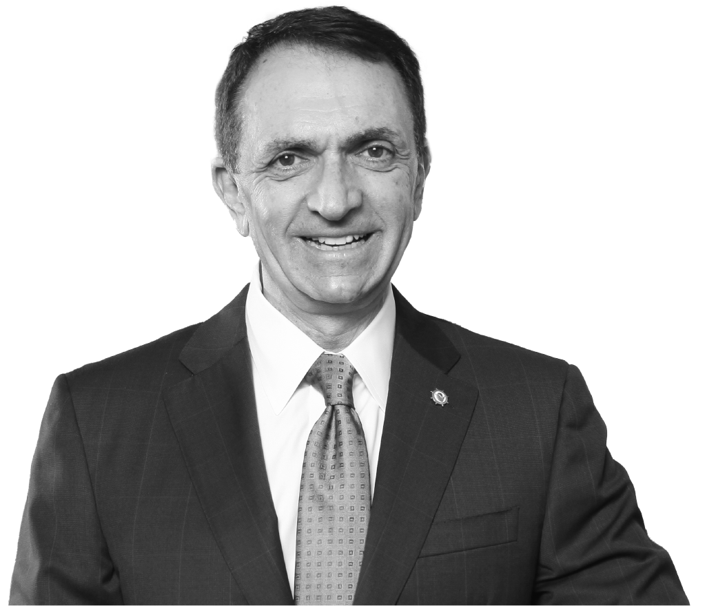 Dean Trantalis in a suit smiling at the camera.